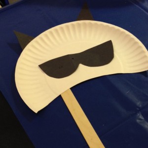 We traced a pair of sunglasses to create the raccoon's mask!